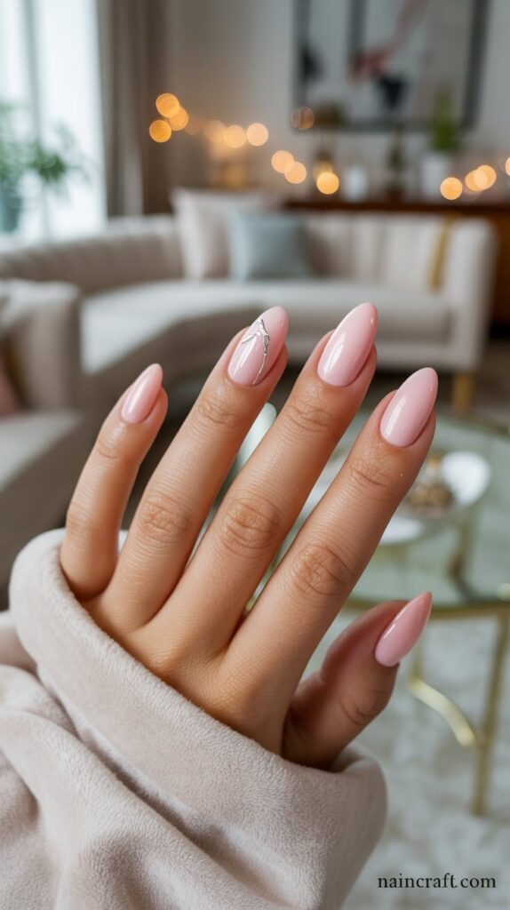 Soft Pink Glossy Almonds nails Designs