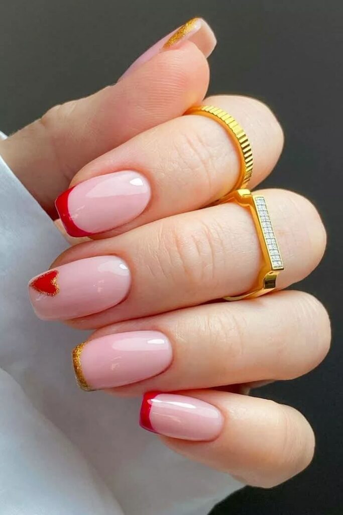 Glossy Nude Nails with Red Tips