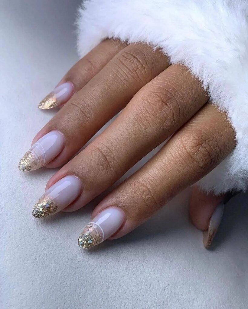Nude Nails with Gold Glitter Tips