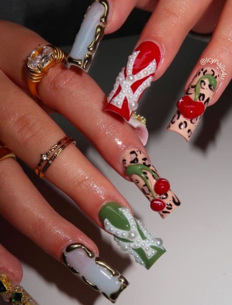Artistic Cherry Nails with Pearls and Leopard Accents