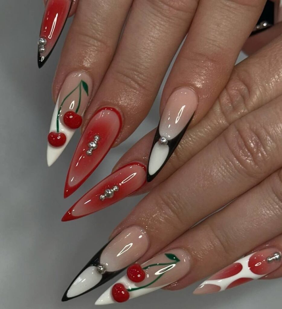 Stiletto Red Cherry Nails with Silver Accents