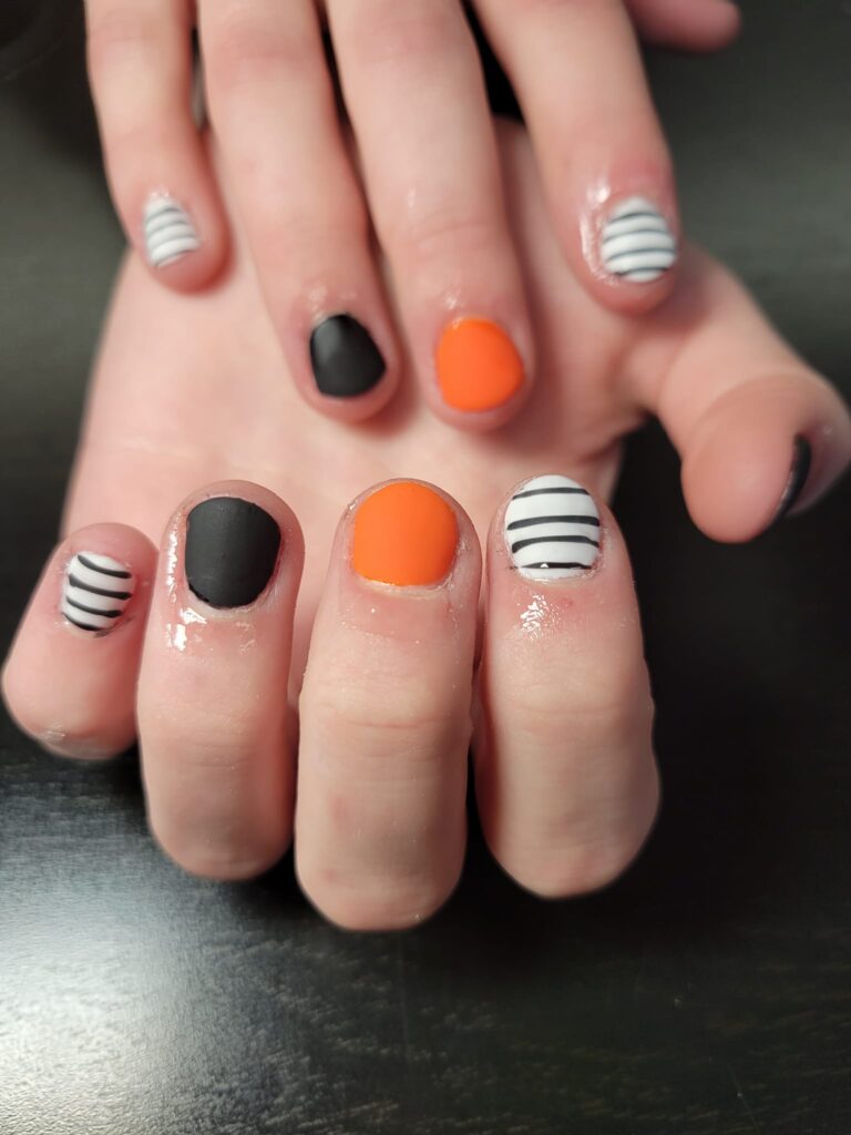 Cute Thanksgiving Nails with Orange and Stripes