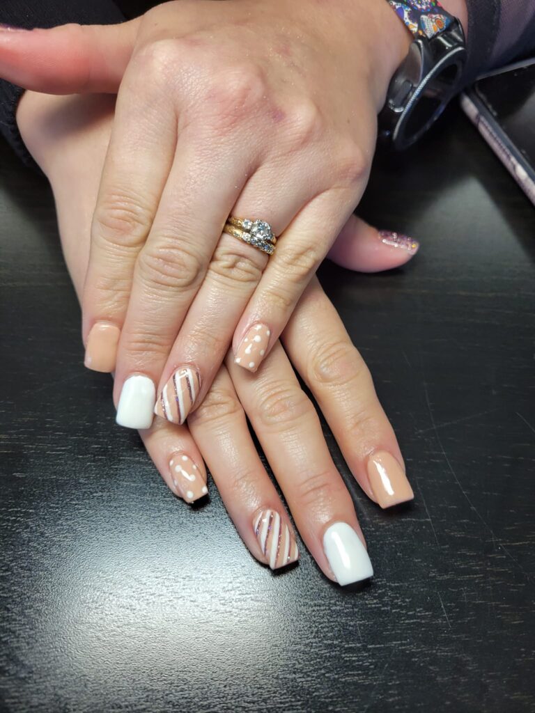 Cute Thanksgiving Nails with White and Nude Accents