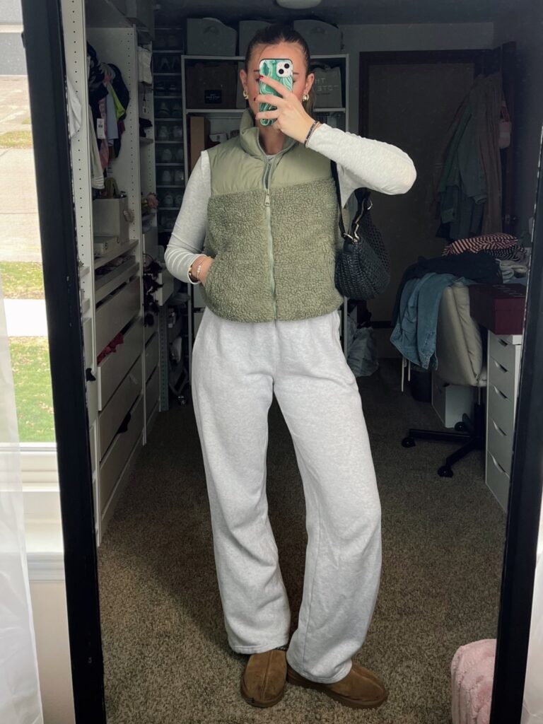 Green Vest and Gray Sweatpants